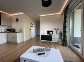 Uroczy Apartamet z Ogródkiem i widokiem na naturę,